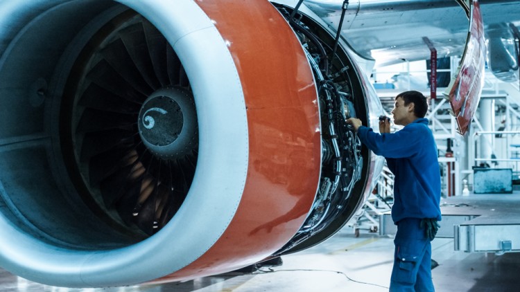 Aerosape Engineer Using Tool For Aircraft Maintinance